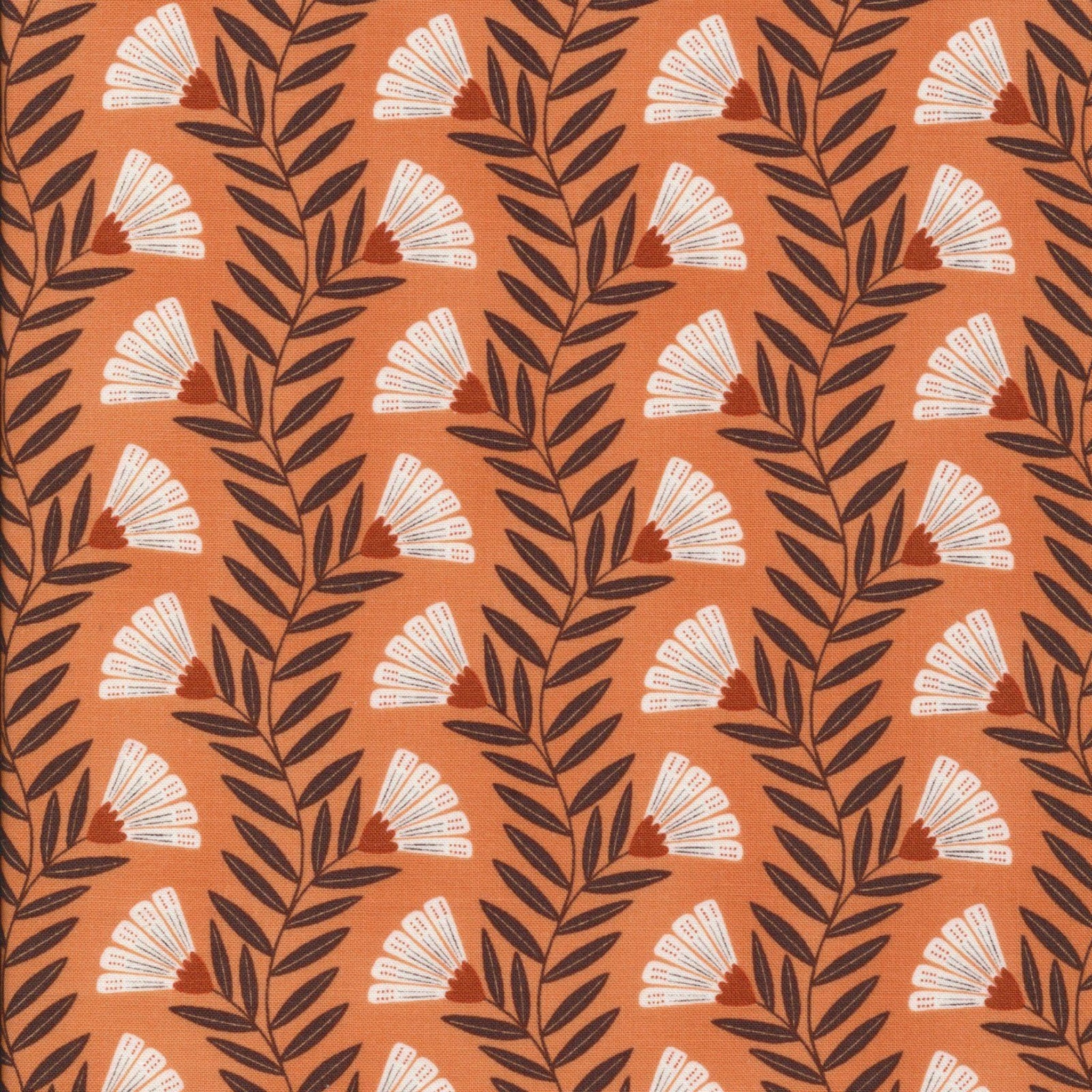 Pattern of leaves and flowers on a orange background. 100% cotton fabric.