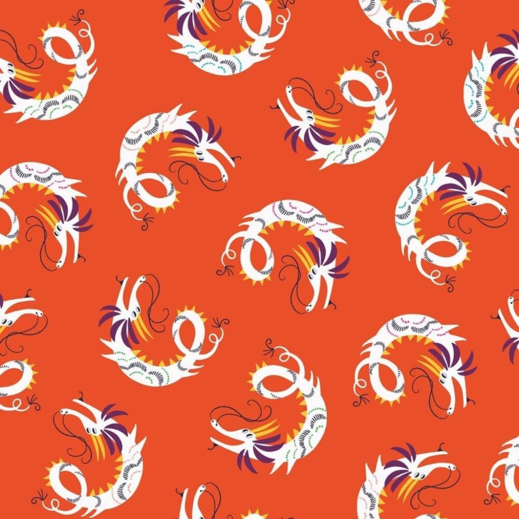 Pattern of stylized dragons on an orange background. 100% cotton fabric.
