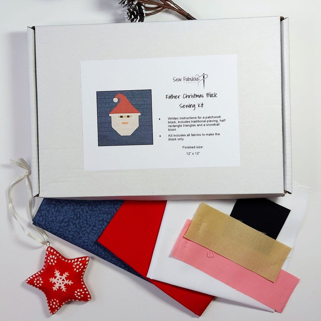 Father Christmas patchwork sewing kit with fabric pieces.