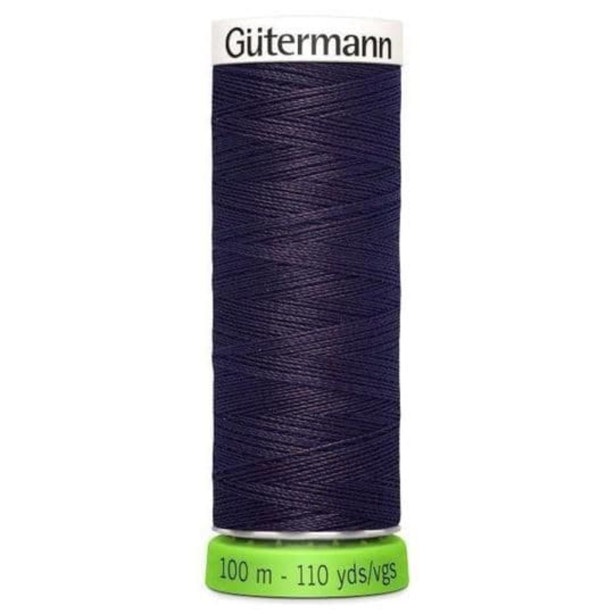 Spool of Gutermann thread on a white background