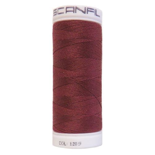 Reel of dark red polyester sewing thread