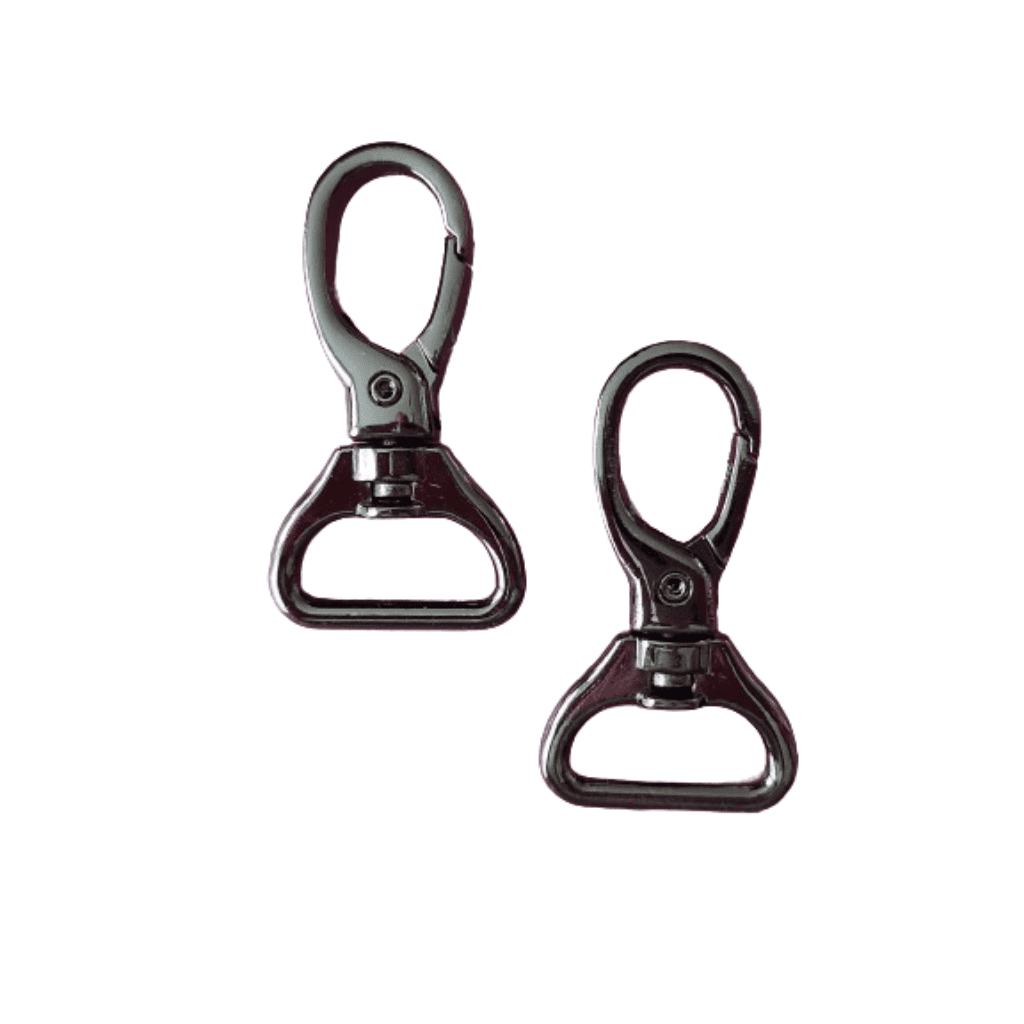 Two gun metal swivel hooks on a white background